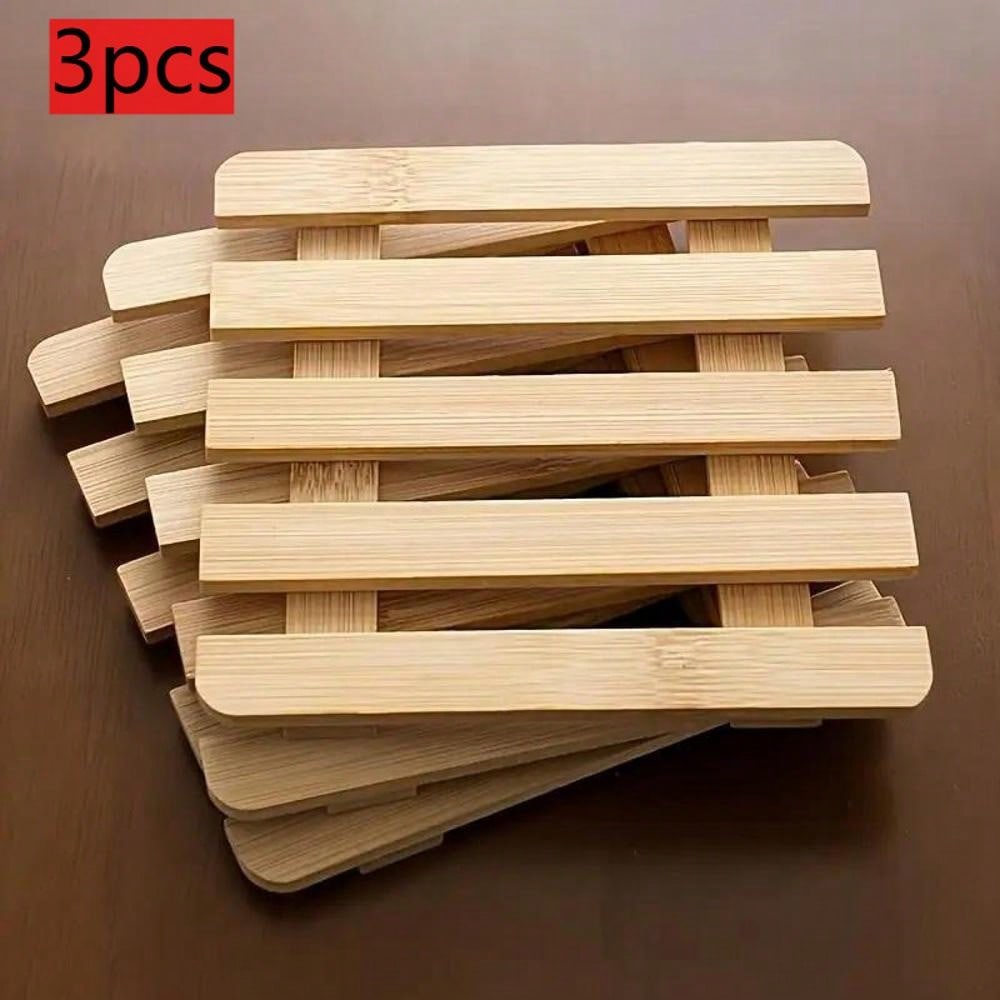 Set Of Three Bamboo Trivets -  - огляд і ціна Kitchen Utensil Holder