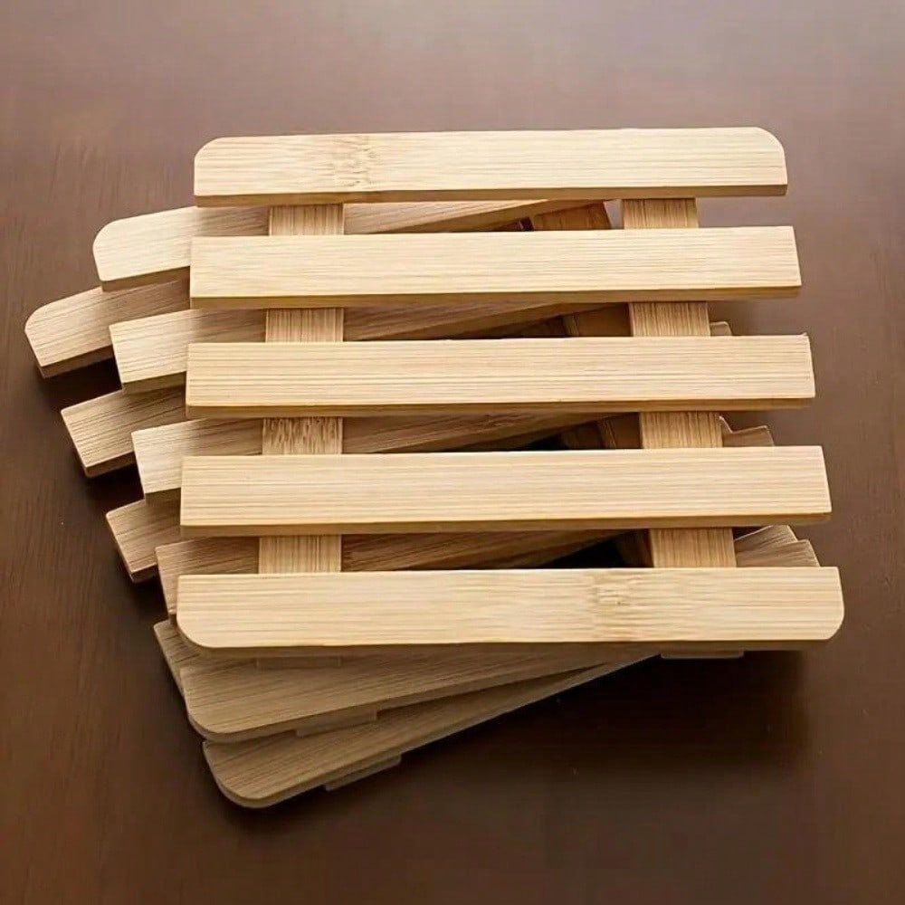 Set Of Three Bamboo Trivets -  - огляд і ціна Kitchen Utensil Holder